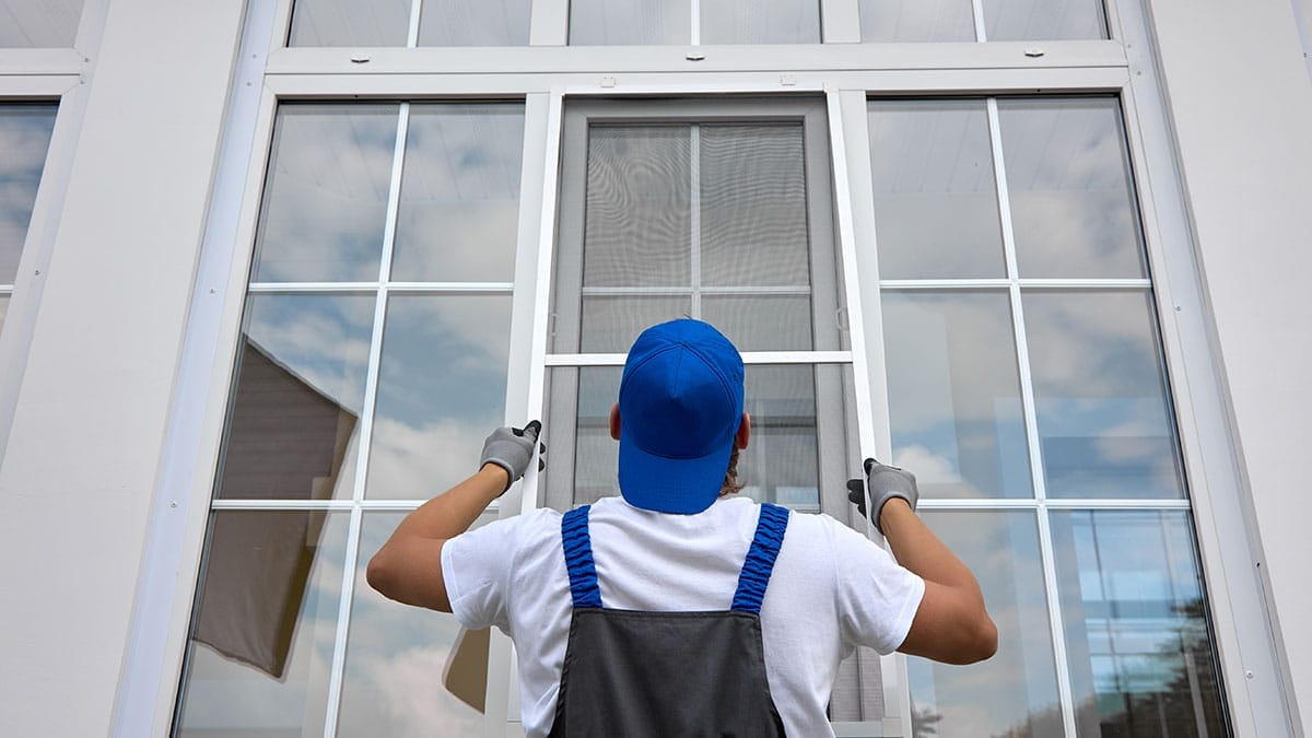Worker installing windows - Example 2